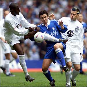 Paul Furlong, Gareth Whalley and Marc Bircham fight for the ball