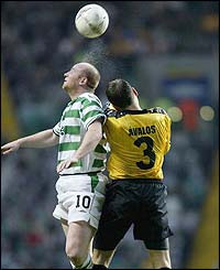 Celtic striker John Hartson rises above the Boavista defence
