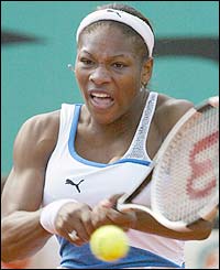 Serena Williams powers a backhand return to Germany's Barbara Rittner