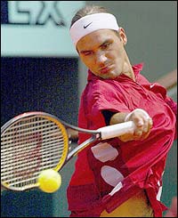 Swiss star Roger Federer blasts a forehand