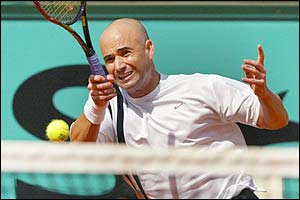 Andre Agassi sends a return to Slovakian Karol Beck