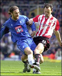Birmingham's Christophe Dugarry is challenged by Sunderland's Joachim Bjorklund 