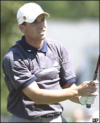 Sergio Garcia watches his drive fly through the air