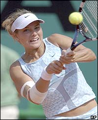 Ashley Harkleroad plays a forehand