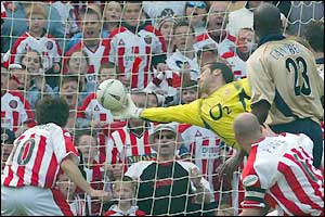 David Seaman produces a magnificent save from Paul Peschisolido