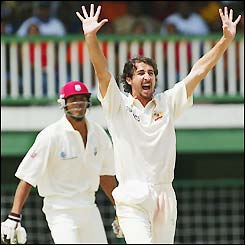 Australia's Jason Gillespie celebrates his third wicket of the day 