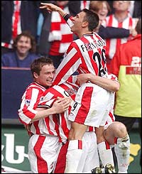 Southampton's Matt Oakley and Fabrice Fernandes celebrate after Brett Ormerod scores against Watford