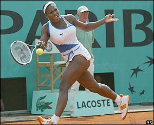 Serena Williams charges across court to hit a forehand