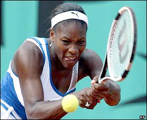 Serena Williams hits an aggressive forehand