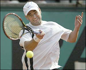 Andre Agassi hits a forehand