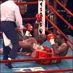 In 1999 Lewis out-boxes Holyfield for most of the 12 rounds, while the judges declare a draw