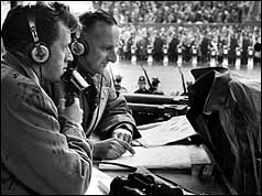 Bernard Braden (L) and Brian Johnston (R) commenting on proceedings in Hyde Park