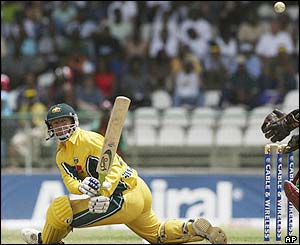 Australia's Andy Bichel hits a sweep shot