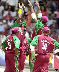 West Indies players celebrates the dismissal of Darren Lehmann