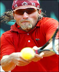 Arnaud Clement hits a return