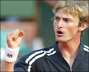 Juan Carlos Ferrero clenches his fist in triumph
