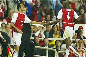 Patrick Vieira limps off the field in the 34th minute