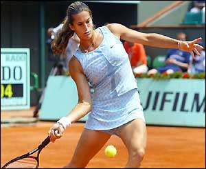 Amelie Mauresmo moves to hit a forehand