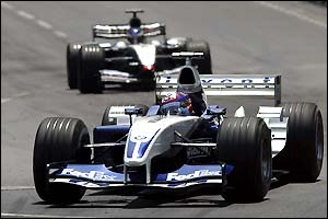 Juan Pablo Montoya's Williams ahaed of McLaren's Kimi Raikkonen