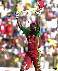 Wavell Hinds celebrates reaching his ton and leading the West Indies to victory