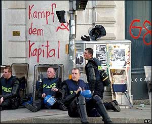 Geneva riot police take a break