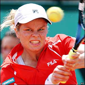 Belgium's Kim Clijsters backhands to Spains Conchita Martinez 