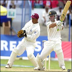 Ricky Ponting cuts the ball away
