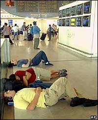Sleeping passengers at Roissy airport, France