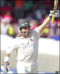 Darren Lehmann celebrates reaching his century