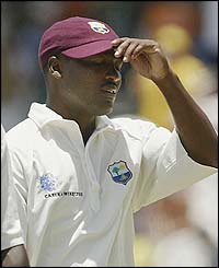 West Indies captain Brian Lara looks dejected as Australia pile on the runs 