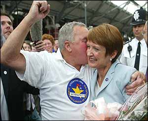 Tessa Jowell embraced by Liverpudlian on arrival in the city
