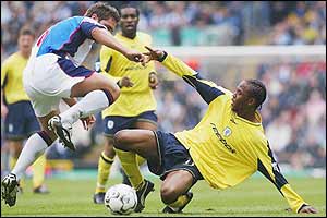 Rover's David Dunn tussles with Wanderers' Ricardo Gardner in a goalless draw at Ewood Park