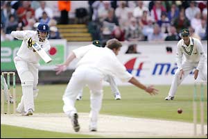 Marcus Trescothick hits out, striking the ball past Heath Streak