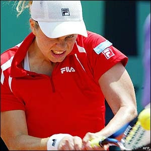 Belgium's Kim Clijsters returns the ball to her Russian opponent Nadia Petrova 