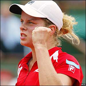 Belgium's Kim Clijsters clenches a fist after winning her semi-final