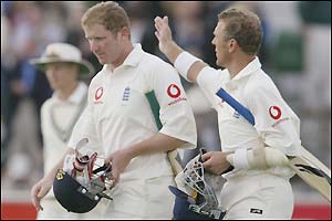 Anthony McGrath (left) is congratulated by Alec Stewart as they leave the field