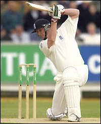 England batsman Anthony McGrath plays a shot through the covers