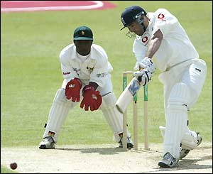Richard Johnson plays a drive on the way to scoring 24 on his Test debut