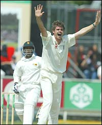 James Anderson appeals for lbw against Zimbabwean opener Dion Ebrahim