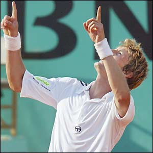 Juan Carlos Ferrero celebrates reaching the final of the French Open