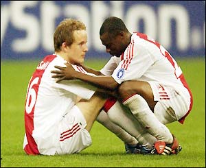 Ajax's Petri Pasanen and Jelle Van Damme are devastated after their defeat