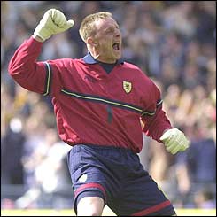 Keeper Douglas shows his delight as Scotland draw with Germany 