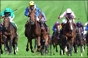 Kris Kin charges to the front to win the Derby