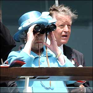 Queen Elizabeth II watches her horse Chief Yeoman through binoculars 