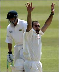Richard Johnson appeals for an lbw against Mark Vermuelen