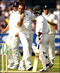 Richard Johnson celebrates a sixth wicket and fifth lbw decision as Tatenda Taibu turns to walk from the wicket