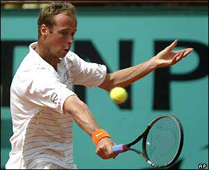 Martin Verkerk reaches to play a backhand