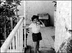 Hanna on the balcony of the Bacon family apartment