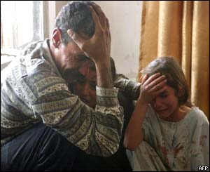 An Iraqi man and child