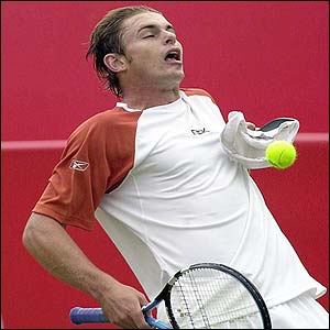 Third seed Andy Roddick keeps his eye on the ball during his match against South African qualifier Rik de Voest
